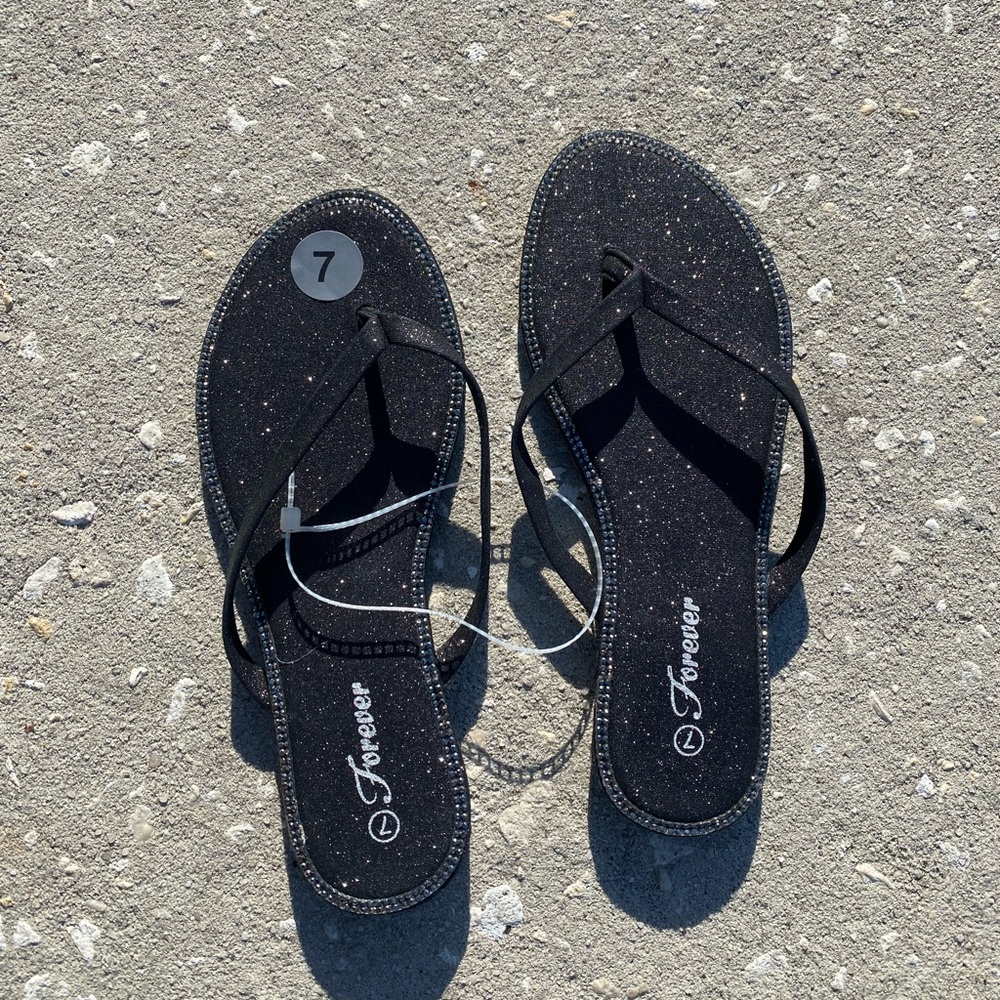 Black glittery sandals in size 8.5